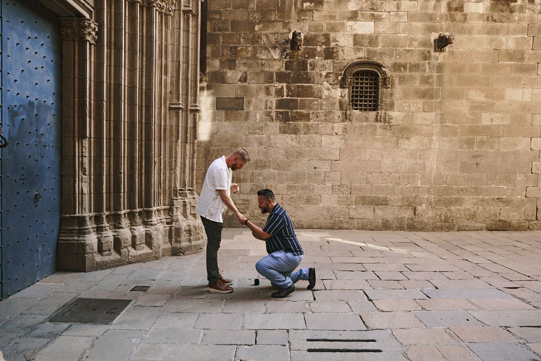 Two men celebrating their love in a hidden square in Barcelona
