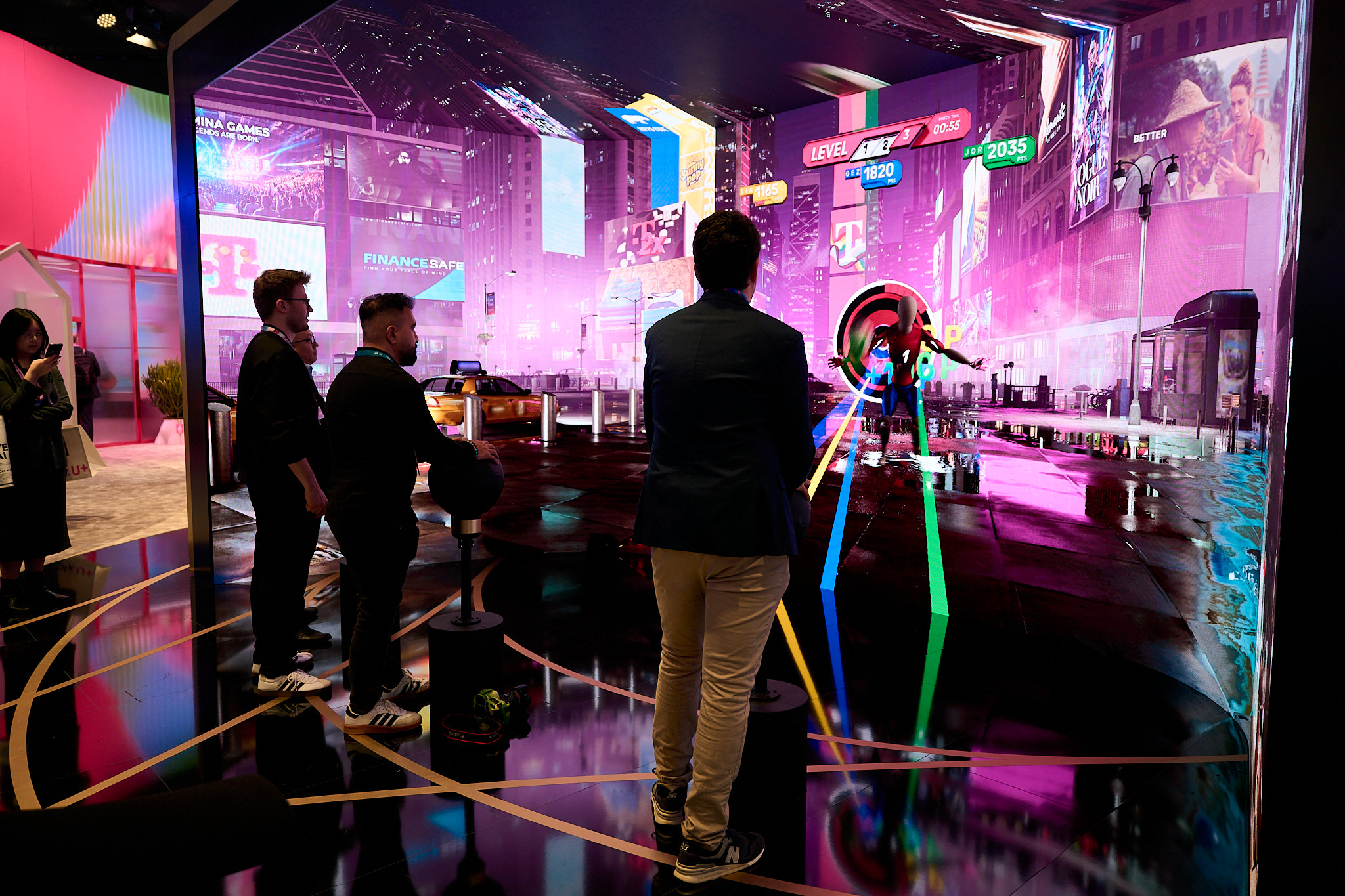 People interacting with interactive metaverse exhibition at mwc 2026